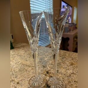 Set of Waterford toasting flutes.
